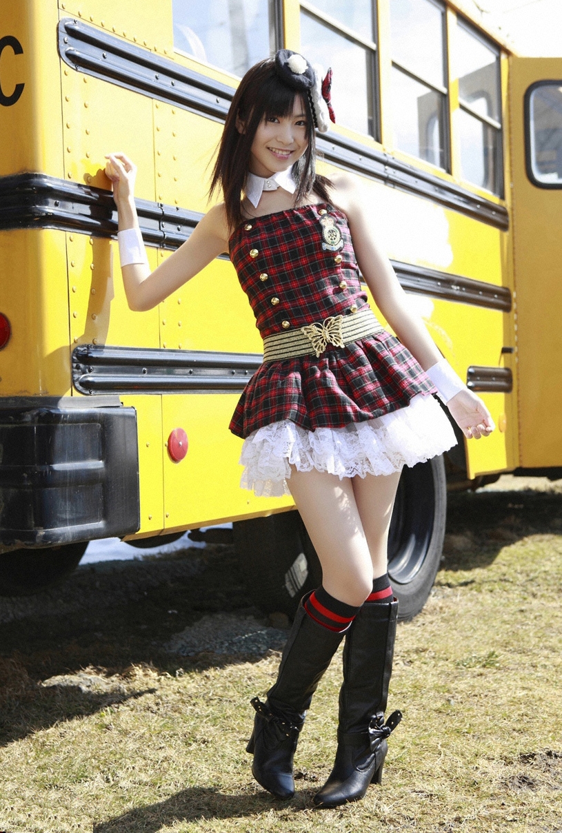 Brunette Asian Schoolgirl wearing Black Long Socks and Black Boots